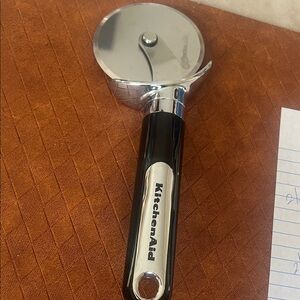 KitchenAid Silver and Black Pizza Cutter